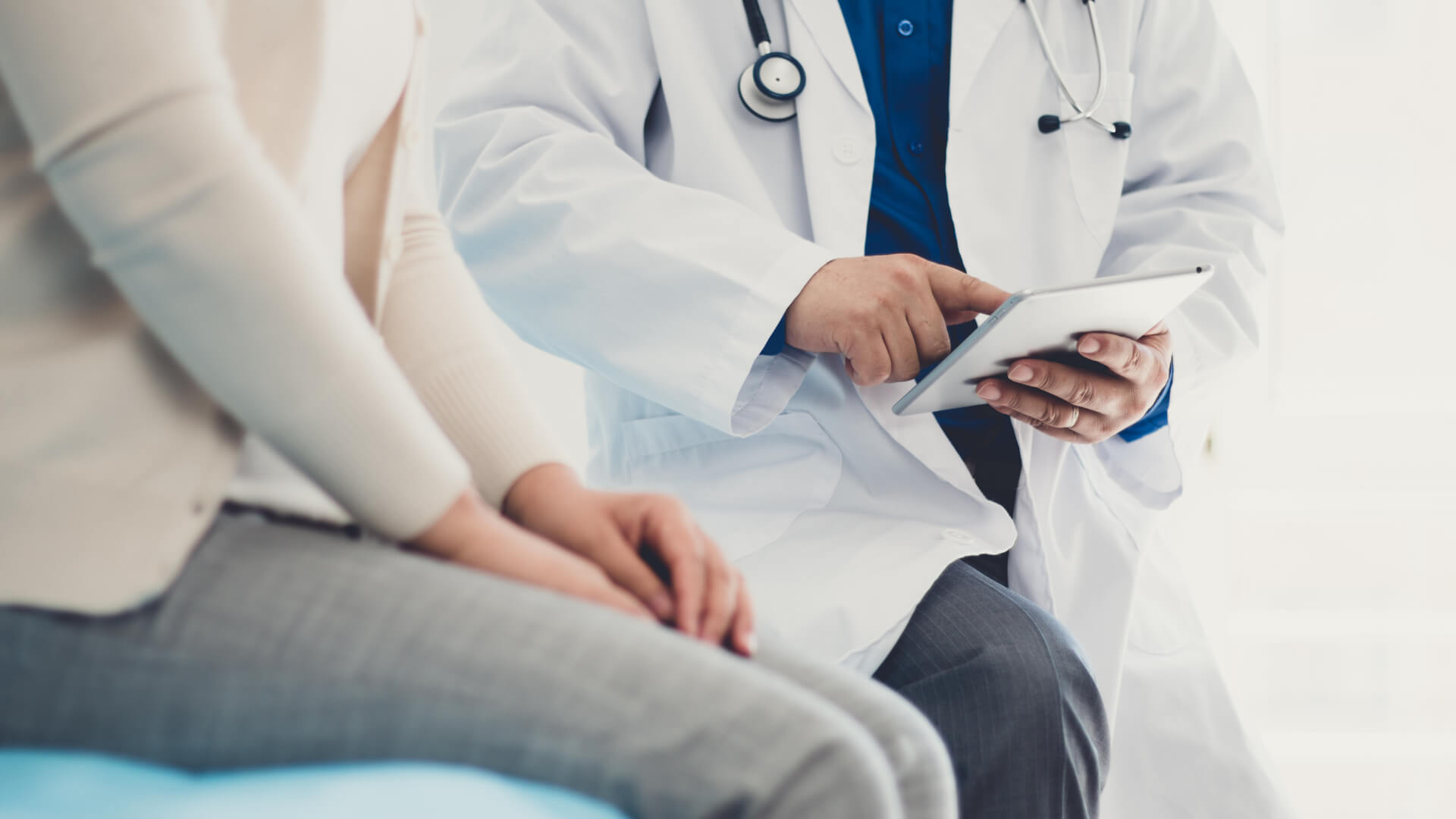 Doctor and Patient Sitting Talking Image