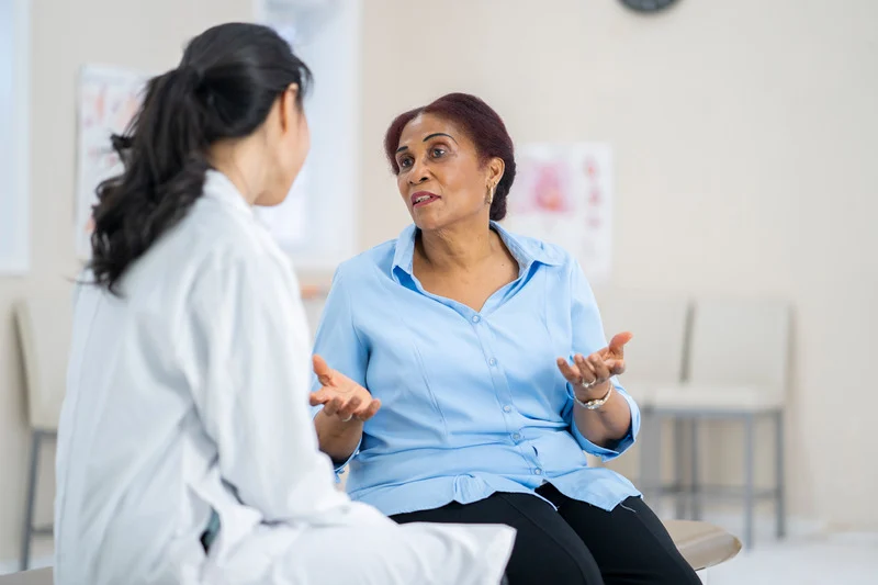 kidney specialist consulting with a diabetic patient